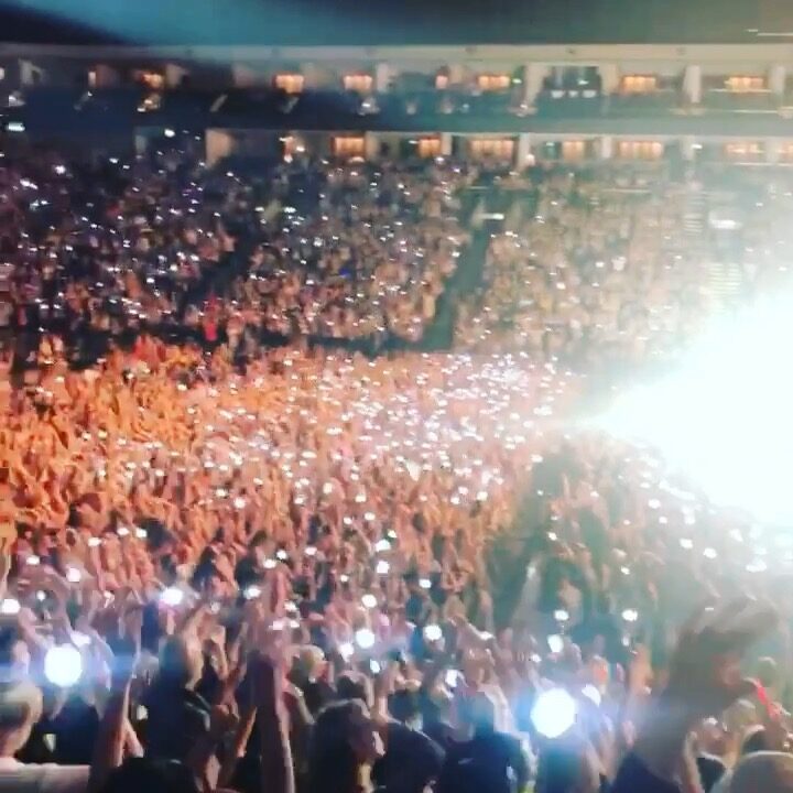 Stadium crowd with phone lights